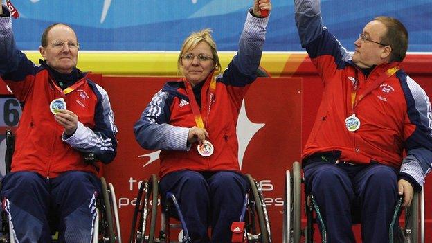 Angie Malone (centre) celebrates winning silver in Turin in 2006