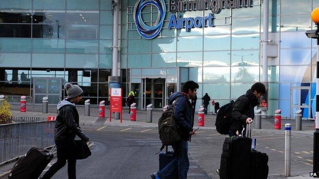 Passengers arriving at Birmingham Airport