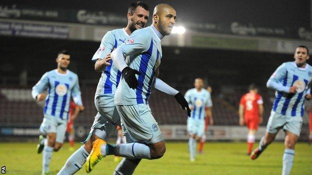 Coventry City's Leon Clarke (front) celebrates with Dan Seabourne (back left) after scoring the second goal of the game against Hartlepool United