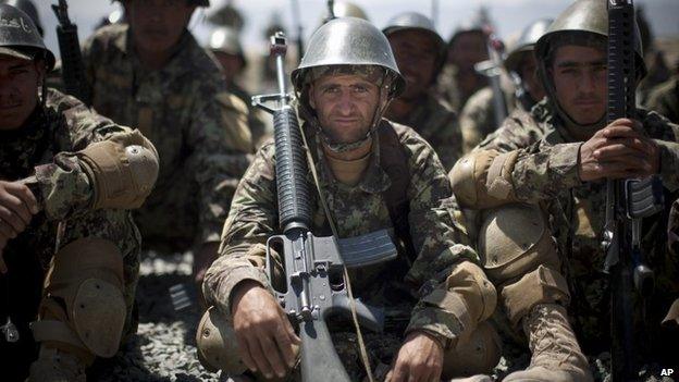 Afghan Army soldiers gather at a military training facility in the outskirts of Kabul, Afghanistan