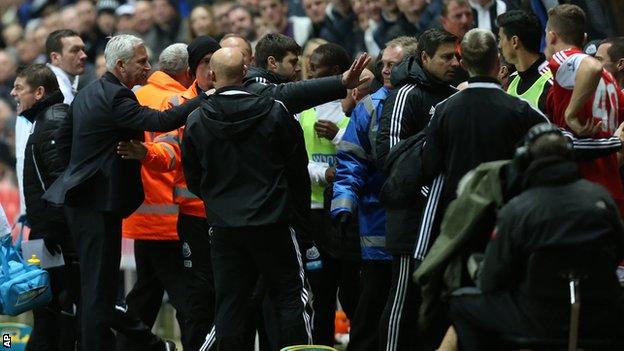 Newcastle and Southampton players and staff clashing