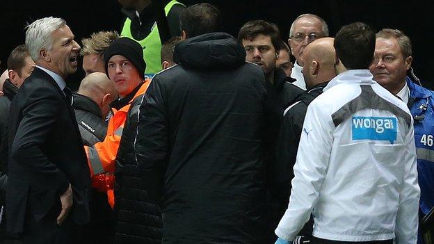 Newcastle and Southampton players and staff clashing