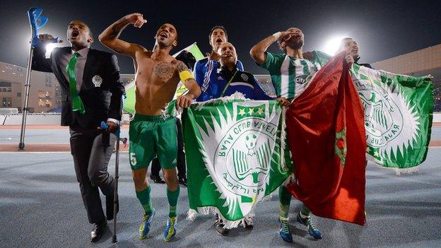 Raja Casablanca players celebrate victory over Atletico Mineiro