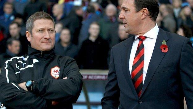 Cardiff assistant manager David Kerslake and boss Malky Mackay