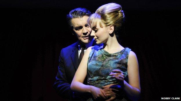 Stephen Ward (Alexander Hanson) and Mandy Rice Davies (Charlotte Blackledge) in Stephen Ward. Photo by Nobby Clark.jpg