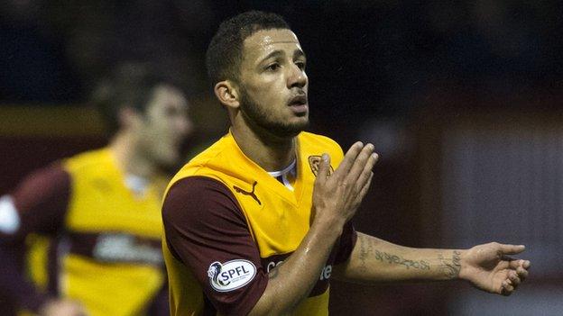 Lionel Ainsworth celebrates scoring for Motherwell