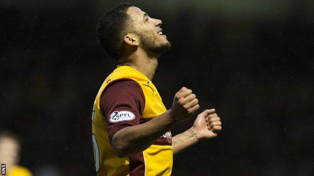 Lionel Ainsworth celebrates scoring for Motherwell