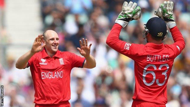 James Tredwell of England celebrates with Jos Buttler during the ICC Champions Trophy Semi-Final match between England and South Africa at The Kia Oval in June