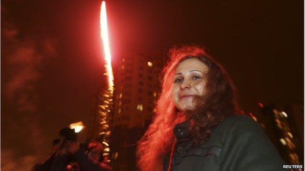 Maria Alyokhina near a decorative street light after her release from a penal colony in Nizhny Novgorod December 23