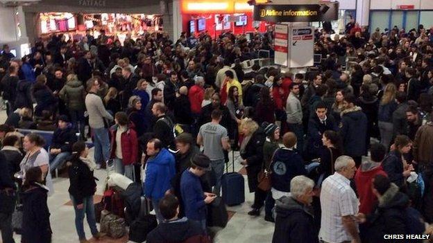 Passengers waiting at Gatwick Airport