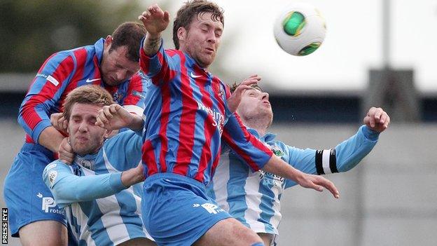 Ards in Irish Premiership action against Warrenpoint Town