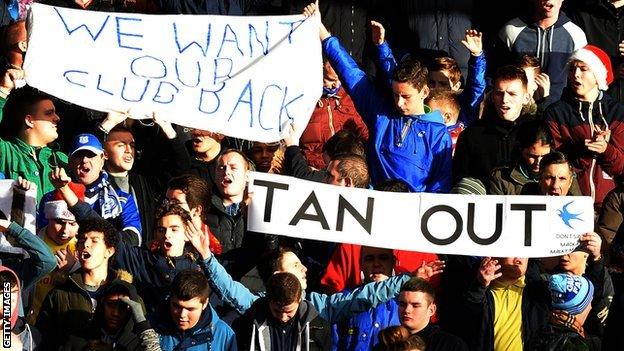 Cardiff fans protest at Anfield