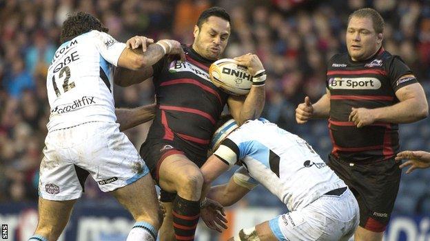 Edinburgh's Ben Atiga can find no way through a Glasgow duo