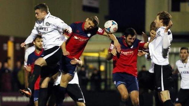 Mike Phenix heads Telford's late equaliser against Hednesford on Boxing Day