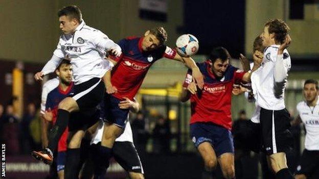 Mike Phenix heads Telford's late equaliser against Hednesford on Boxing Day