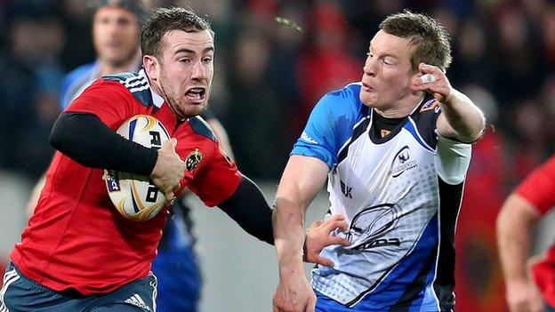 JJ Hanrahan tries to fend off Eoin Griffin at Thomond Park