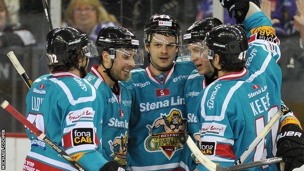 Craig Peacock (centre) is congratulated after scoring Belfast's late fourth goal on Friday night