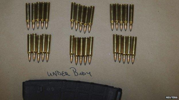 Bullets and a magazine are shown in this evidence photo released by the Connecticut State Police (27 December 2013)