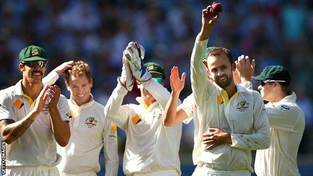 Nathan Lyon celebrates his fifth wicket