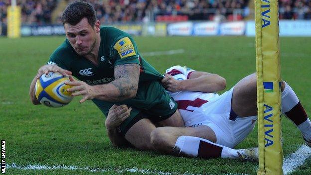 Alex Thompstone holds off Charlie Ingall to score Leicester's second try