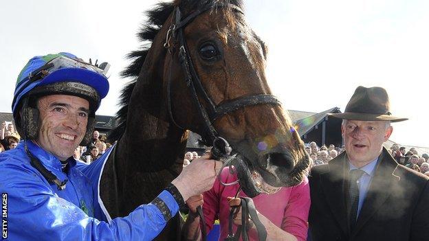 Hurricane Fly with jockey Ruby Walsh (l) and trainer Willie Mullins