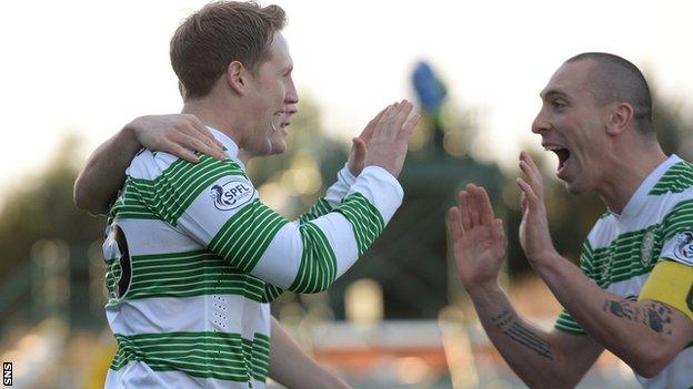 Kris Commons celebrates with Scott Brown