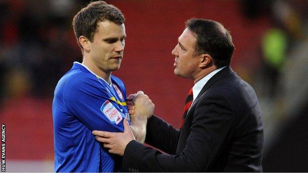 Cardiff City defender Ben Turner with former manager Malky Mackay