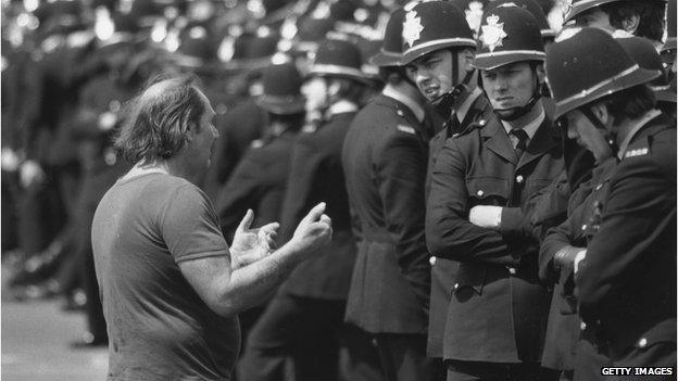 Picket talking to policemen during miners strike of 1984