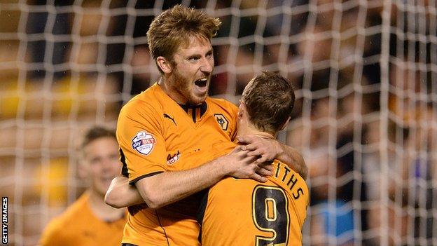 Wolves winger James Henry celebrates with Leigh Griffiths