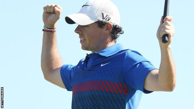 Rory McIlroy celebrates winning the Australian Open