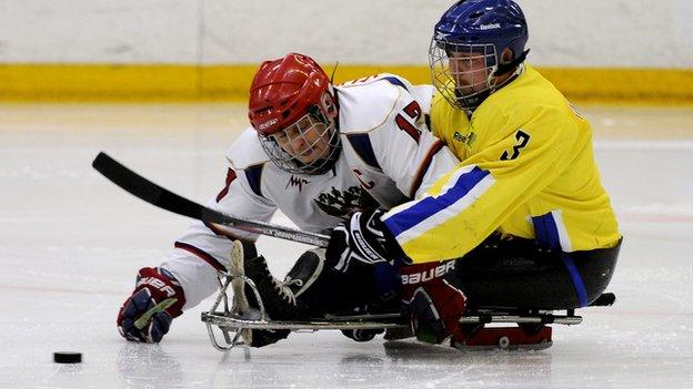 Sweden and Russia play sledge hockey