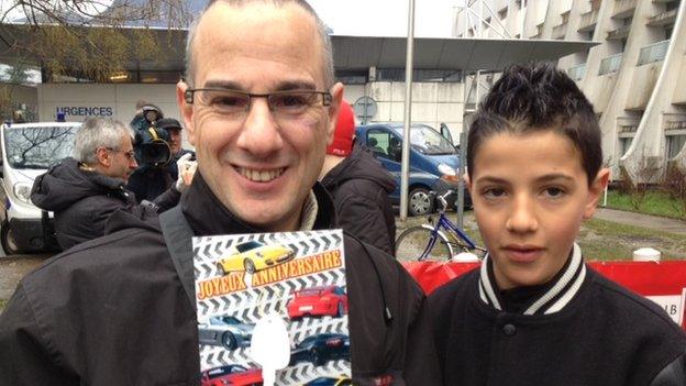 Schumacher fans David and Samuel with birthday card (3 Jan 2014)