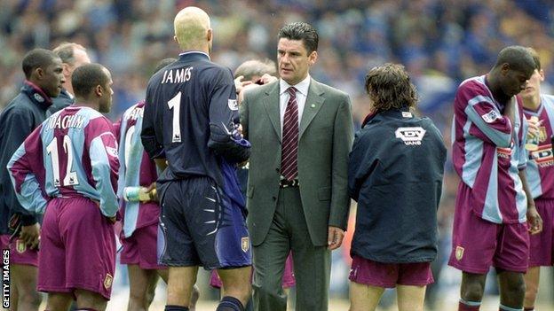 Villa boss John Gregory consoles his team after their FA Cup final defeat by Chelsea at Wembley 14 years ago