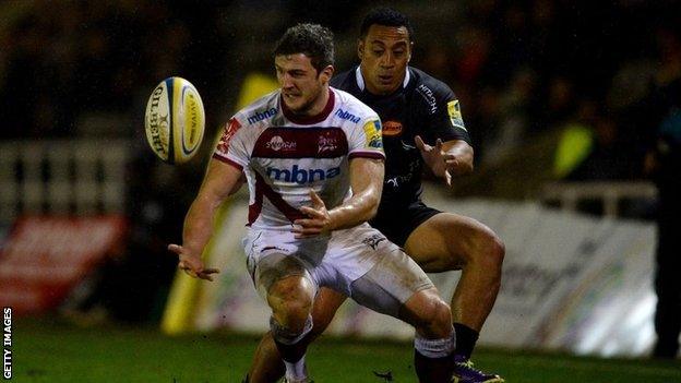 Sinoti Sinoti (r) of Newcastle Falcons tackles Tom Brady of Sale Sharks