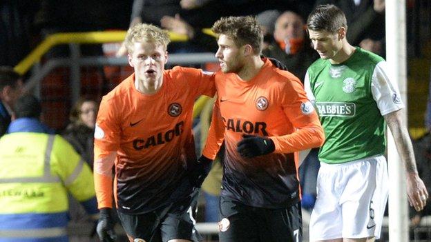 Gary Mackay-Steven congratulates David Goodwillie on pulling a goal back for United