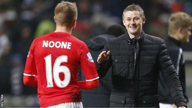 Cardiff manager Ole Gunnar Solskjaer congratulates Craig Noone after his goal at Newcastle