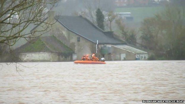 Anne-Marie Simpson said she was "keen to get away" after 13 days surrounded by floodwater