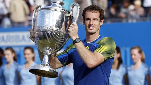 Andy Murray lifts the Aegon Championships trophy at Queen's