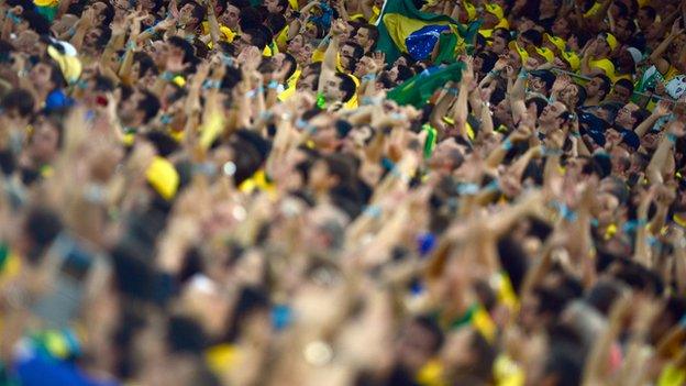 Brazilian fans celebrate during the FIFA Confederations Cup Brazil 2013 final football match, at the Maracana Stadium in Rio de Janeiro on June 30, 2013.