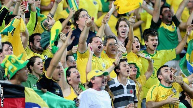 RIO DE JANEIRO, BRAZIL - JUNE 30: Brazil fans celebrate during the FIFA Confederations Cup Brazil 2013 Final match between Brazil and Spain at Maracana on June 30, 2013 in Rio de Janeiro, Brazil.