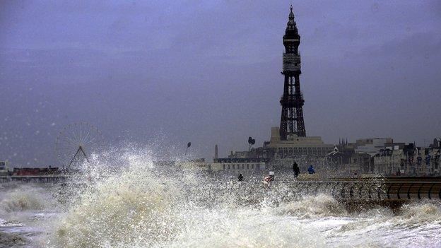 Waves crash on to the promenade at Blackpool as high tides and huge waves hit the west coast of the UK