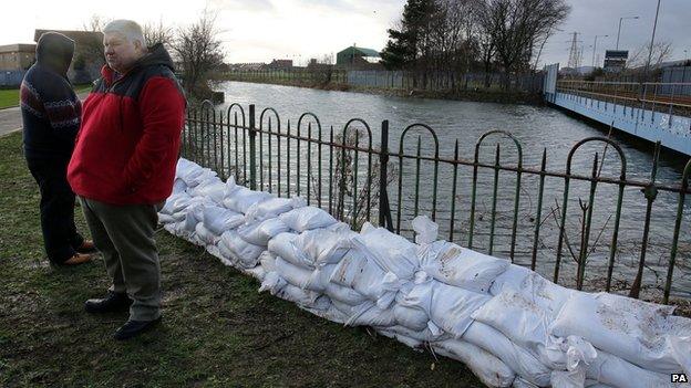 Local people at the Connswater River in Belfast