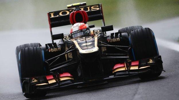 Romain Grosjean races the Lotus at the Brazilian Grand Prix