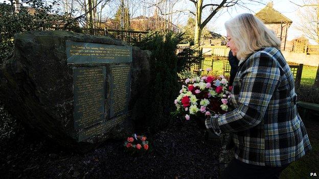 Lesley Pendleton lays flowers at the Kegworth air disaster memorial