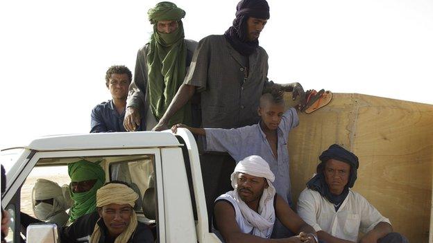 workers on a truck