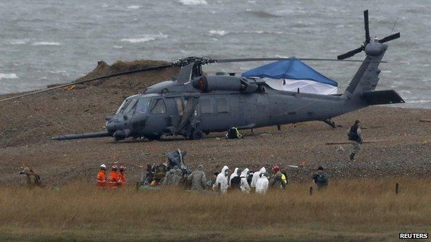 Body being removed from crash site