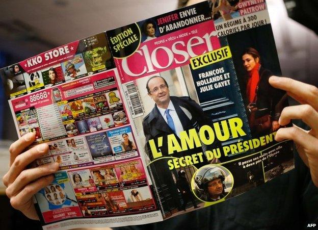 A man reads Closer magazine in Paris, 10 January