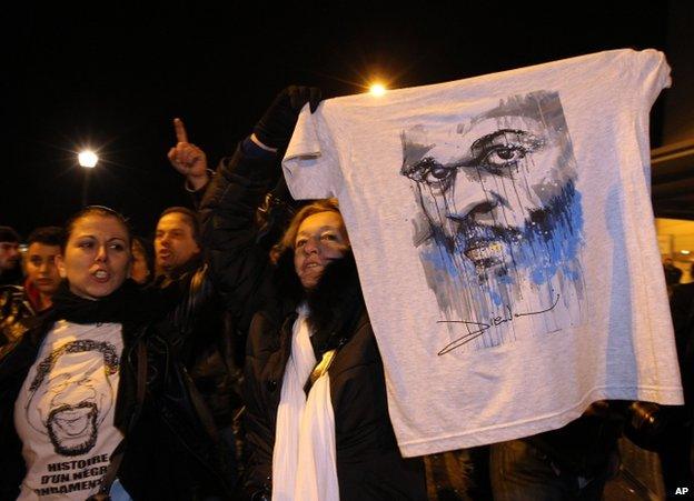 Supporters wave a tee-shirt of Dieudonne M'bala M'bala in Nantes, 9 January