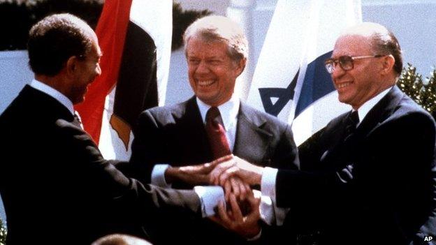 Sadat, Carter and Begin celebrate the Camp David Agreement in 1979