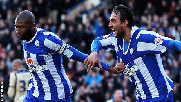 Reda Johnson of Sheffield Wednesday celebrates the opening goal against Leeds